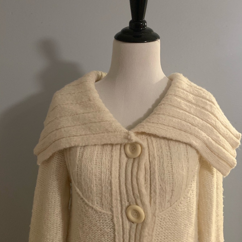 Urban Outfitters cream sweater.